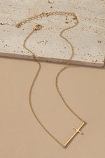 HAMMERED SIDEWAY CROSS NECKLACE