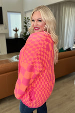 Noticed in Neon Checkered Cardigan in Pink and Orange