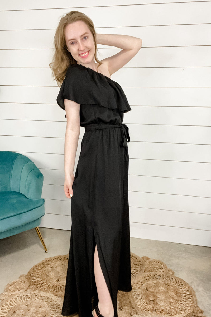Party's Not Over- Black One Shoulder Belted Maxi Dress w/ Ruffle Detail